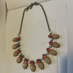 Statement necklace with pink and faux pearls